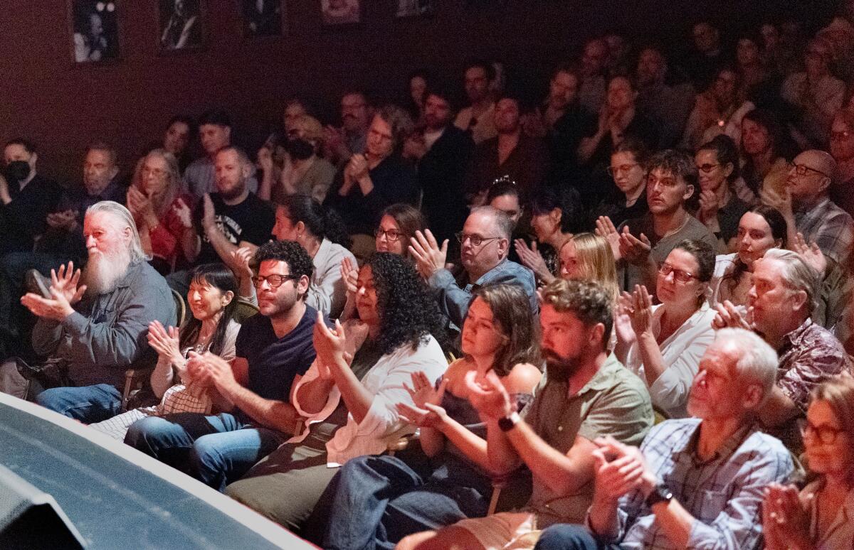 An audience applauding