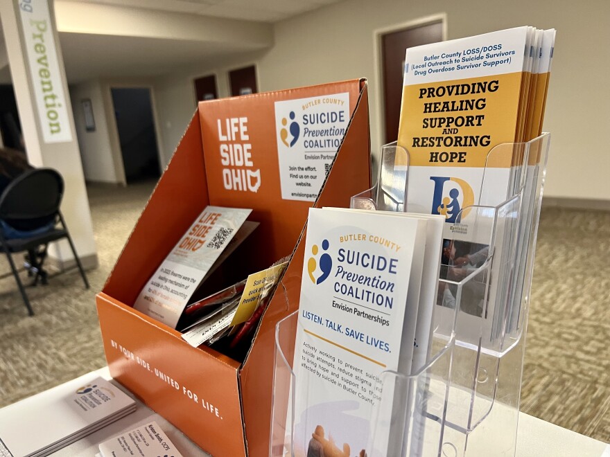 Suicide prevention pamphlets sit on a table at Envision Partnerships, a prevention agency in Butler County in southwest Ohio.
