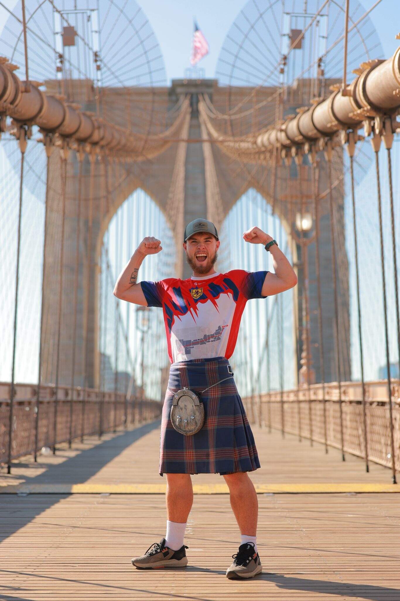 Craig Ferguson poses in front of the Brooklyn Bridge for the Tartan Trek challenge. (Courtesy Craig Ferguson)