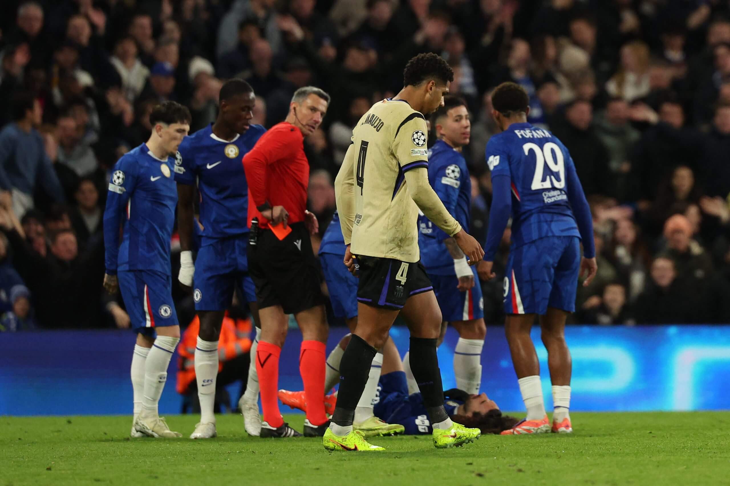 Araujo leaves the pitch after being shown two yellow cards before half-time in a Champions League game at Chelsea