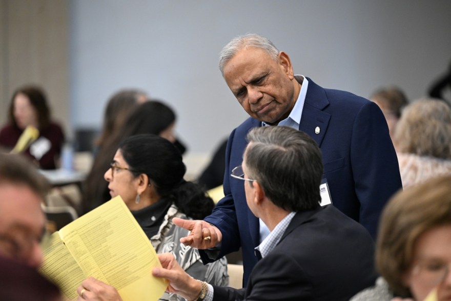 Dr. Hemant Jain, director of UTC’s Journey Health Foundation Research Center, speaks with attendees during a Journey Health data summit event.