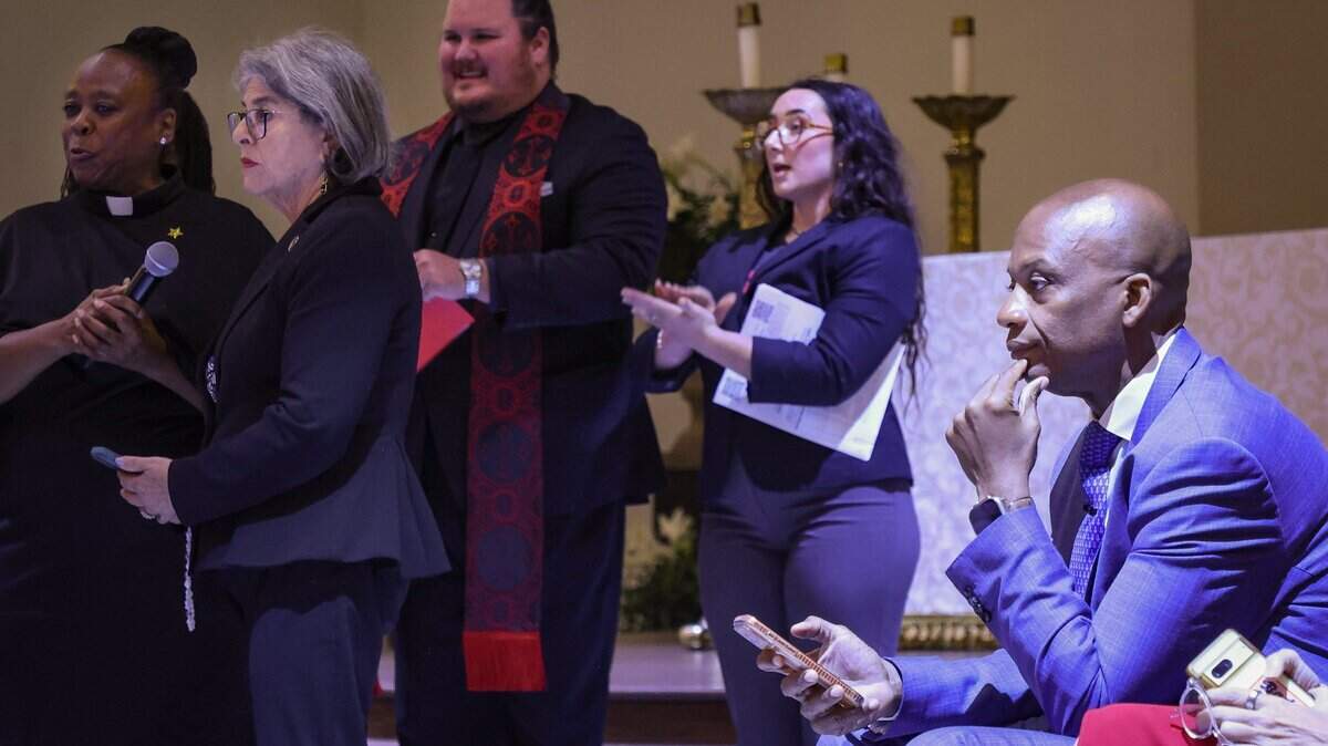 Mayor Daniella Levin Cava, right, gets applause from religious leaders and attendees after giving her support for the Center for Mental Health and Recovery as Miami-Dade Commissioner Oliver G. Gilbert, III, right, waits to respond.   

Religious leaders and local and county government officials gathered for the Annual Nehemiah Action, a large community-based public assembly organized by faith-based and grassroots justice coalitions, to addressed issues of affordable housing and the cycle of the unsheltered and incarceration on Monday, April 13, 2026, at Corpus Christi Catholic Church in Miami, Florida.