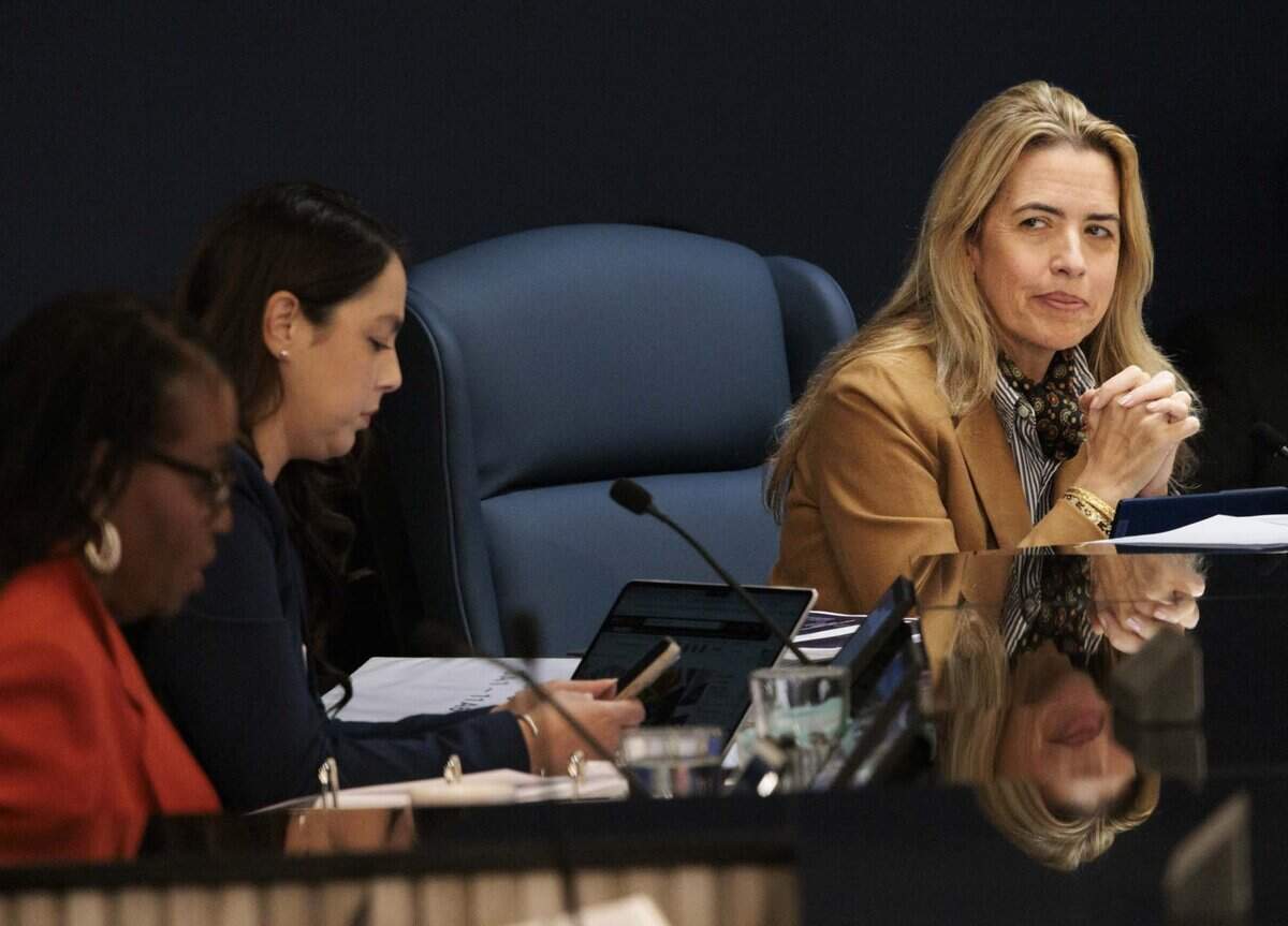 Commissioner Raquel Regalado, right, receives recognition from fellow commissioner Marleine Bastien for her work on the item to open Miami Center for Mental Health and Recovery during a county commission meeting on Tuesday, June 16, 2026, at the Stephen P Clark Government Center in downtown Miami, Fla. The commission voted in favor of opening the Miami Center for Mental Health and Recovery, a treatment facility designed for people with mental illness facing minor criminal charges.