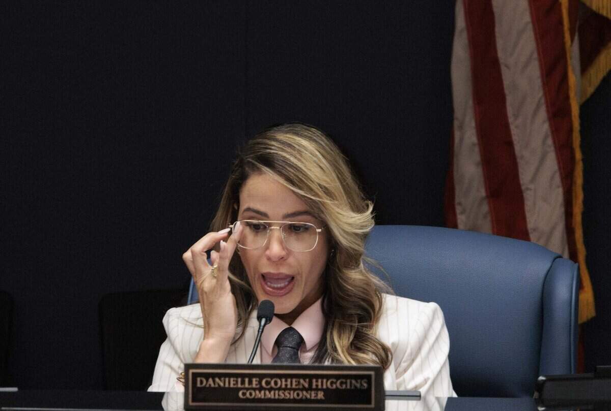 Commissioner Danielle Cohen Higgins tears up while speaking about her brother who she lost to substance abuse during a county commission meeting on Tuesday, June 16, 2026, at the Stephen P Clark Government Center in downtown Miami, Fla. The commission voted in favor of opening the Miami Center for Mental Health and Recovery, a treatment facility designed for people with mental illness facing minor criminal charges.