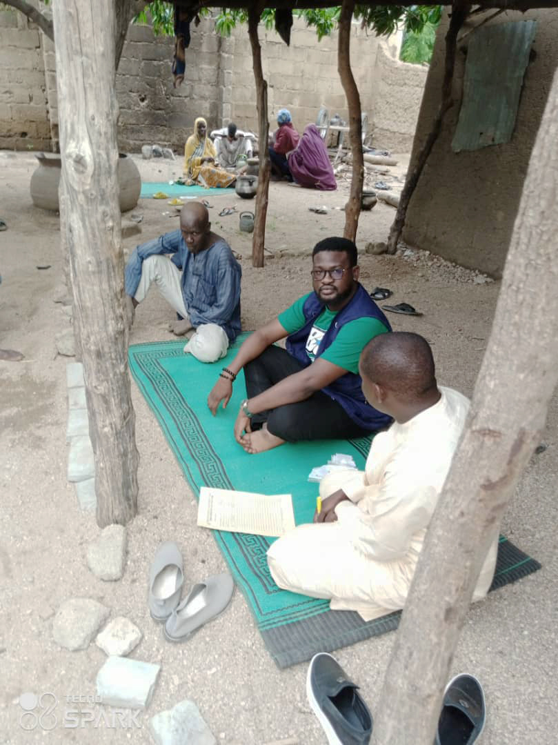 Abdullahi Umar (left) with MHPSS Officer Anthony Daniel (middle) and Nurse Bello Shuaibu.