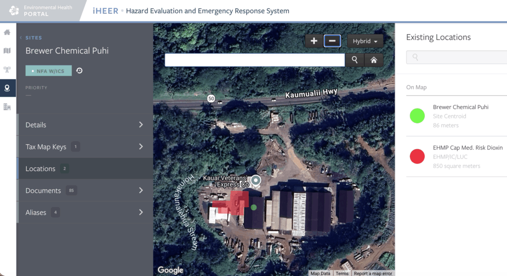 An aerial photograph of an industrial parcel on Kaua‘i with a red area. 