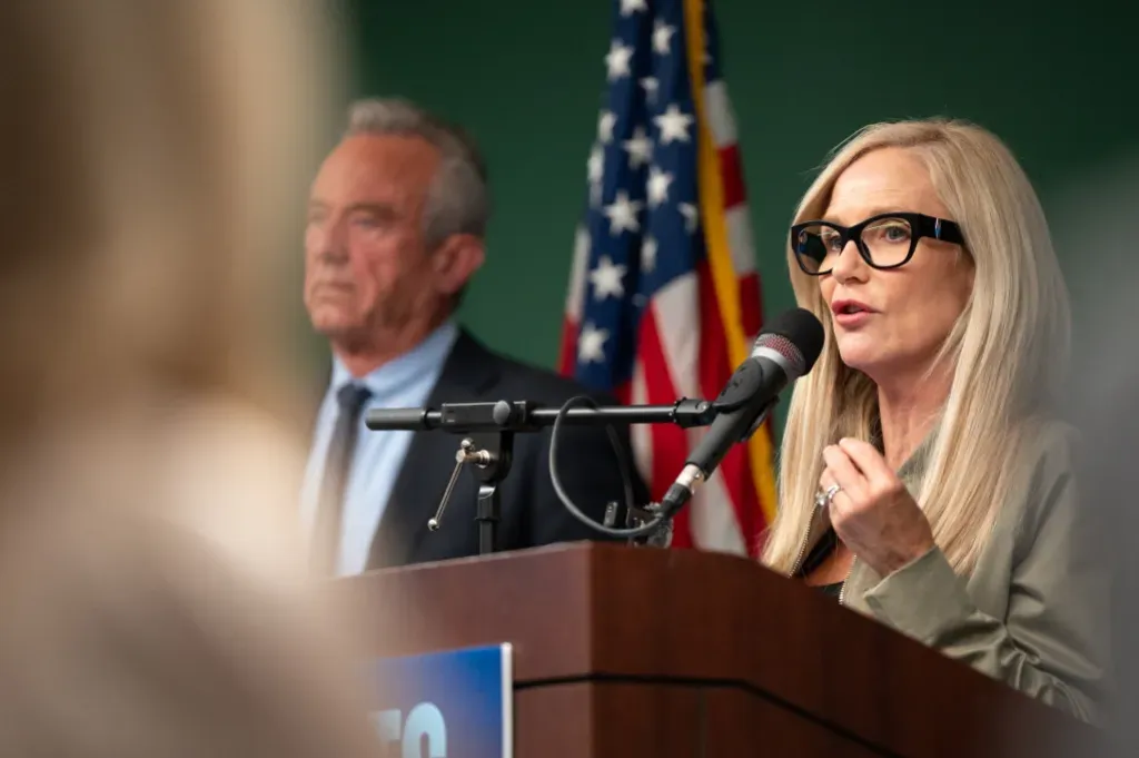 Woman speaks at podium