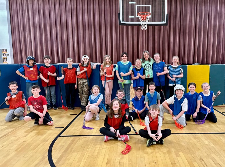 Rindge Memorial School students learning Deck Hockey. 