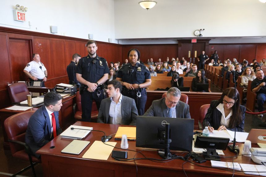 Luigi Mangione appears in court during an evidentiary hearing in New York on December 11, 2025.