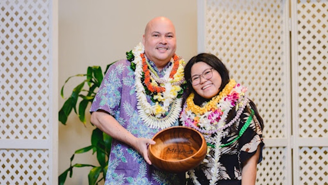Tori Ikeda receives award from Bryan Talisayan